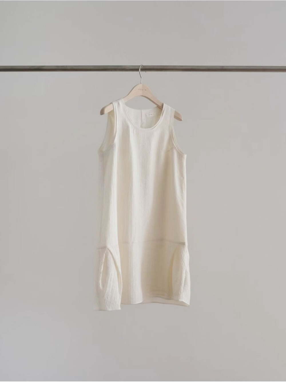 Sleeveless Cream Mini Dress with Relaxed Shift Silhouette